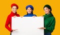 Three Diverse Girls Holding Blank White Board, Studio Shot Royalty Free Stock Photo