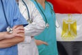 Three Doctors with stethoscope on Egypt flag Royalty Free Stock Photo