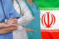 Three Doctors with stethoscope on Iran flag Royalty Free Stock Photo