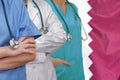 Three Doctors with stethoscope on Qatar flag Royalty Free Stock Photo