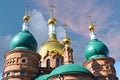 Three domes with crosses of the Orthodox Church, blue sky Royalty Free Stock Photo