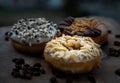 Three doughnuts covered with Almendras, Cookies and creme and Choco peanut butter Royalty Free Stock Photo