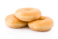 Three doughnuts or donuts piled Royalty Free Stock Photo