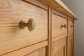 Three drawers handles soft wood