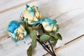 Three Dried Roses