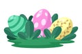 Three Easter eggs lie in the grass on the lawn. Cartoon element for Egg hunting and other Easter design design. Green Royalty Free Stock Photo