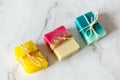 Three ecologic handmade soap bars, white marble background