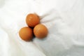 Three Eggs On The Fabric Cotton White Background
