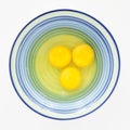 Three eggs ready to beat. Royalty Free Stock Photo