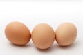 Three eggs on a white background Royalty Free Stock Photo