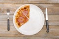 Three eighth - Pizza pieces series as illustration of division in maths on wood table Royalty Free Stock Photo