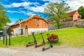 Three electric scooters stand on the grass in front of historical buildings in the old town of Oslo, Norway Royalty Free Stock Photo