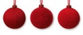Three elegant red decorative Christmas ornaments on a white background Royalty Free Stock Photo