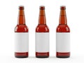 Three empty beer bottles isolated on white background Royalty Free Stock Photo