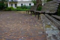 Three empty benches in a London park Royalty Free Stock Photo