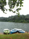 Three empty boats in front at Periyar lake, Kerala, India