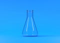 Three empty erlenmeyer flask on yellow background