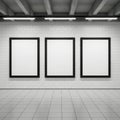 Three empty frames on a wall, isolated on white background Royalty Free Stock Photo