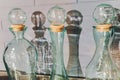 Three empty glass bottles standing in a row. Royalty Free Stock Photo