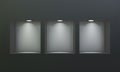 Three empty niches or shelves on black wall with led spotlight 3D mockup Royalty Free Stock Photo
