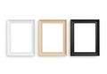 Three empty picture frames in different colors on a white background Royalty Free Stock Photo
