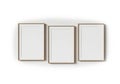Three empty picture frames on wall Royalty Free Stock Photo