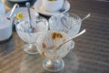 Three empty vases with traces of different ice cream Royalty Free Stock Photo