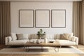 Three empty vertical picture frames in a modern living room with white sofa and beige pillows. Japandi interior. Wall art mockup Royalty Free Stock Photo