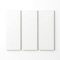 Three blank vertical canvas panels on a white background Royalty Free Stock Photo