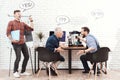 Three engineers work with a 3d printer in a modern laboratory. They have conversational clouds over their heads. Royalty Free Stock Photo