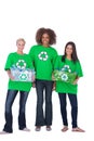 Three enivromental activists with two holding boxes of recyclables