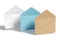 Three envelopes in different colors isolated on white background Royalty Free Stock Photo