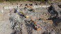 Excavators demolish building. Drone view