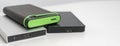 the three external hdd drives one the shelf, data backup storage
