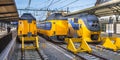 Three Fast Intercity Commuter Trains waiting at a station