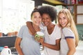 Three Female Friends Enjoying Breakfast At Home Together Royalty Free Stock Photo