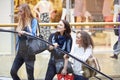 Three Female Friends Shopping In Mall Together Royalty Free Stock Photo