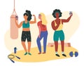 Three females doing sweaty selfie check-ins during gym session. Asian, black and white girls working out.