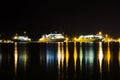 Three ferries at night