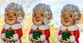 Three festive Christmas granny garden gnomes, UK Royalty Free Stock Photo