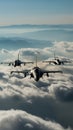 Three fighter jets fly in formation above a thick layer of white clouds and distant mountains Royalty Free Stock Photo