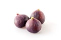 Three figs isolated on white background. Royalty Free Stock Photo