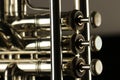 Three finger button close up of a trumpet instrument Royalty Free Stock Photo