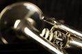 Three finger buttons close up of trumpet with bell and tuning slide Royalty Free Stock Photo