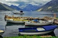 Three fishing boats moored in small dock in bay, Montenegro Royalty Free Stock Photo