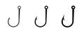 Three fishing hooks in different sizes displayed in a row
