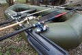 Three fishing spinning in a rubber boat Royalty Free Stock Photo