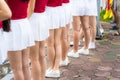 Three fit beautiful young women athletes in lingerie and boots standing grouped together showing their toned buttocks and leg Royalty Free Stock Photo