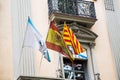 Three Flags on Old Barcelona Building Royalty Free Stock Photo
