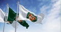 Three flags with the Roland-Garros logo waving in the wind